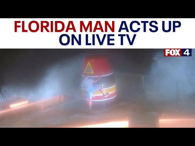 ⁣Florida man gets up close and personal with buoy during Hurricane Helene