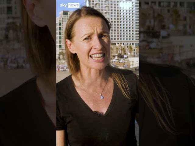 ⁣Sirens ring on Tel Aviv beach during Sky News report