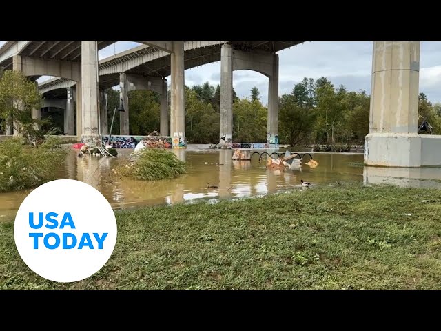 ⁣Debris, flooding fills Asheville's River Arts District after Helene | USA TODAY