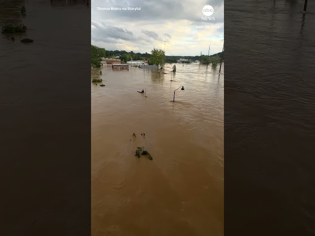 ⁣Major flooding in Asheville after Helene