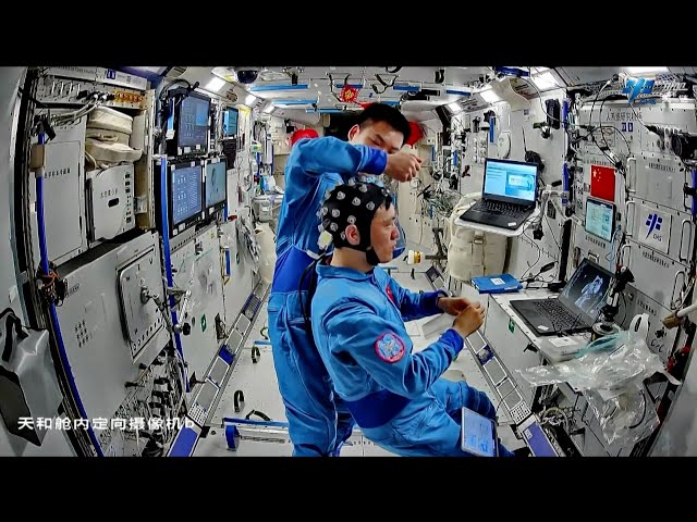 ⁣China's space station crew conducts engineering, cognitive experiments