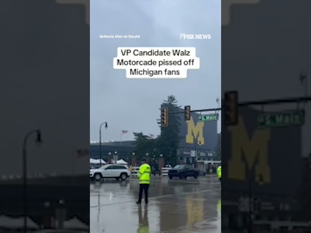 ⁣Tim Walz met with boos as he left a rivalry college football game between Minnesota and Michigan