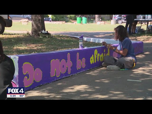 ⁣Fort Worth students paint positive messages on park wall