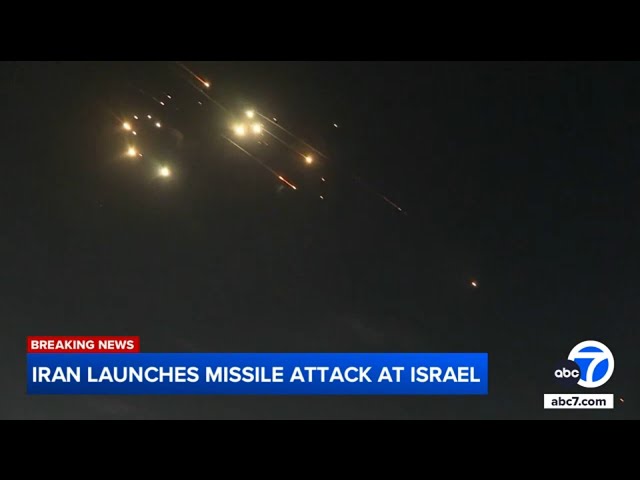 ⁣Iran fires nearly 200 missiles into Israel as conflict escalates