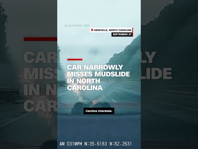 ⁣Car narrowly misses mudslide in North Carolina