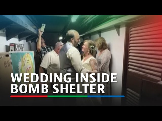 ⁣US couple finish wedding inside bomb shelter as missiles fly over Israel