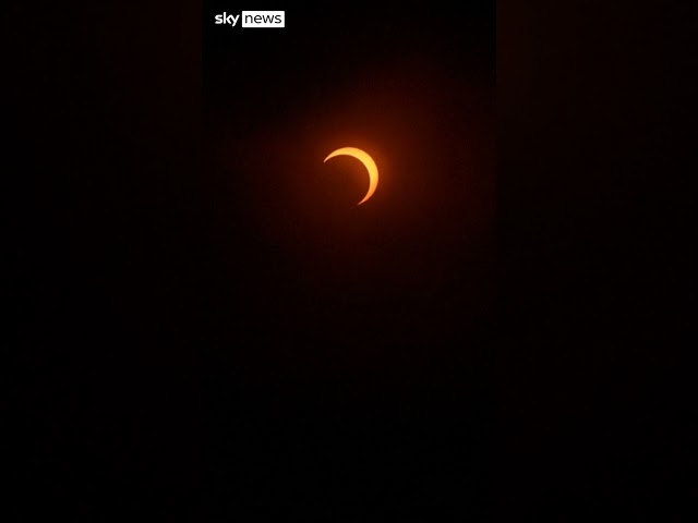 ⁣Easter Island visitors watch eclipse