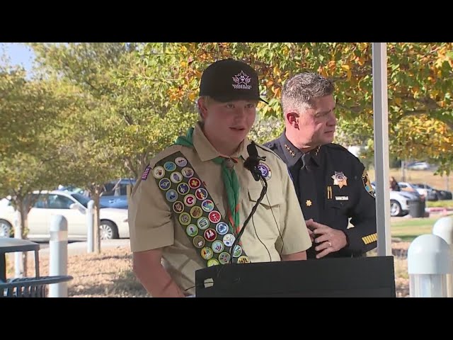 ⁣Boy Scout installs K-9 memorial outside Douglas County Justice Center