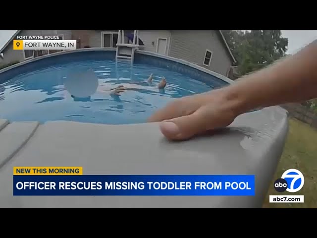 ⁣Hero cop rescues missing toddler found floating in neighbor’s pool