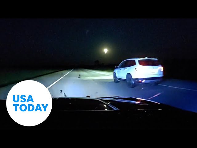 ⁣Police dashcam shows daring rescue of teen in runaway car | USA TODAY