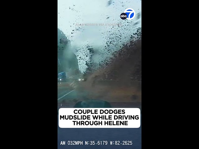 ⁣Couple dodges mudslide while driving through Helene