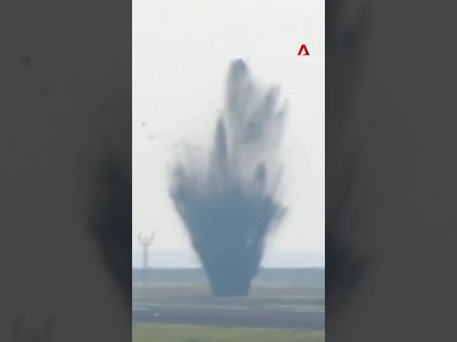 ⁣The moment an unexploded WWII US bomb blew up at an airport in Japan