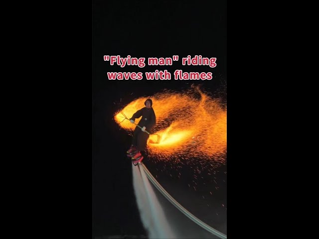 ⁣"Flying man" riding waves with flames