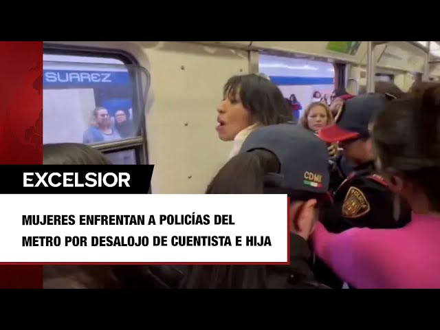 ⁣Mujeres enfrentan a policías del Metro por desalojo de cuentista e hija