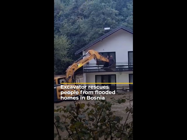 ⁣Excavator rescues people from flooded homes in Bosnia | AJ #shorts