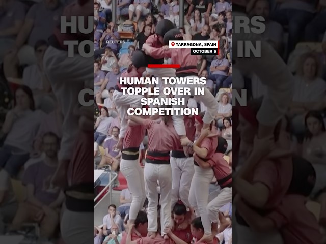 ⁣Human towers topple over in Spanish competition