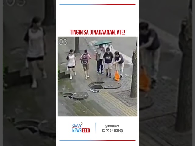 ⁣Babaeng nag-aayos ng payong, nahulog sa manhole | GMA Integrated Newsfeed