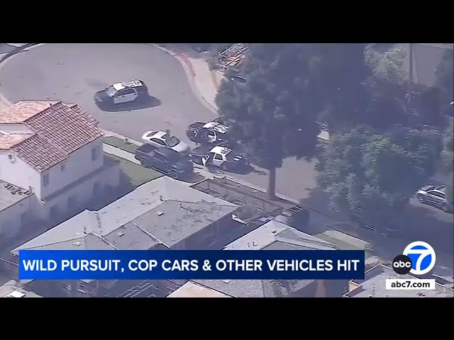 ⁣LA chase: Suspect drives onto curb, crashes into fence and car