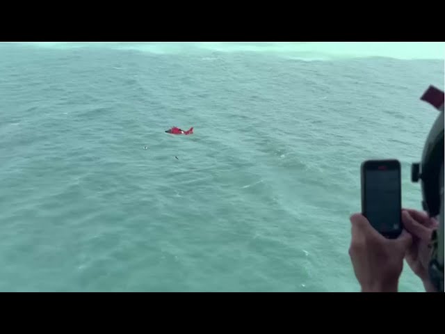 ⁣US Coast Guard's dramatic rescue of man clinging to cooler off Florida coast