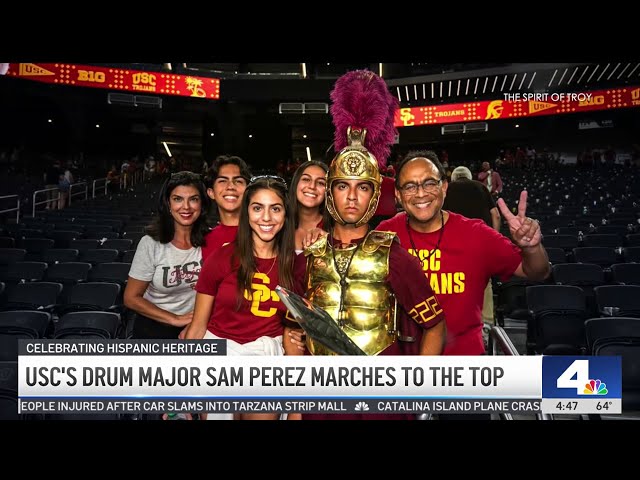 ⁣USC's drum major Sam Perez marches to the top