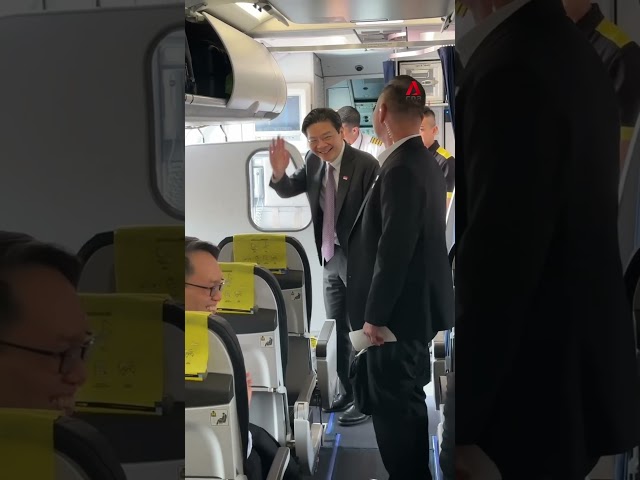 ⁣Scoot passengers cheer when PM Lawrence Wong turns up unexpectedly on flight from Laos to Singapore