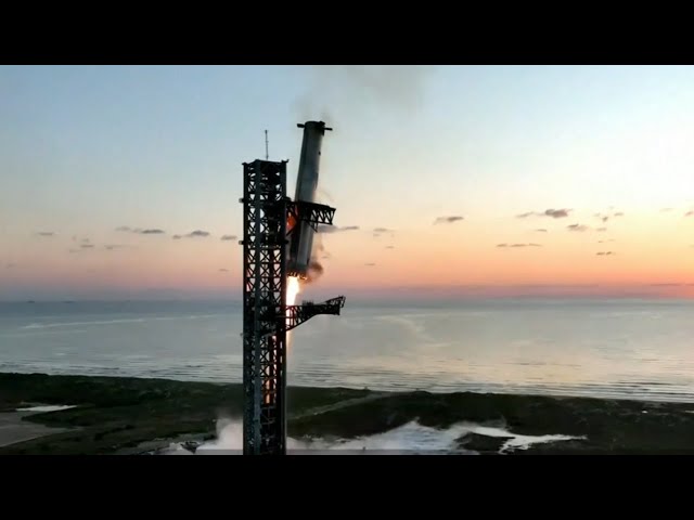 ⁣SpaceX catches super-heavy rocket booster on return to Earth