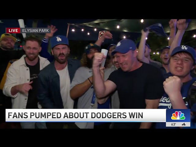 ⁣Dodgers fans celebrate after Game 1 win of NLCS