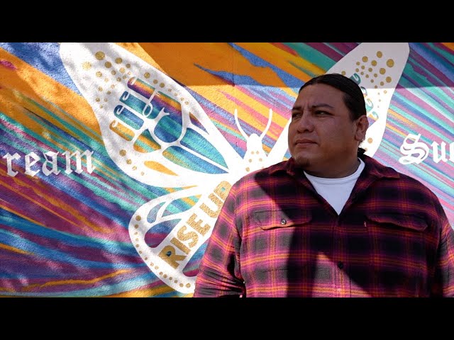 ⁣Local artist merges mural art and spoken word to represent Chicano culture