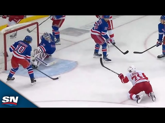 ⁣Red Wings' Justin Holl Finds Dylan Larkin For Buzzer-Beating Goal vs. Rangers