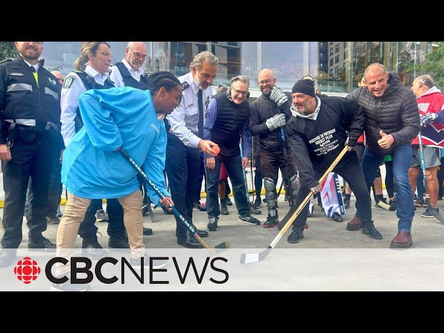 ⁣Police and homeless advocates face off in street hockey game to learn more about each other