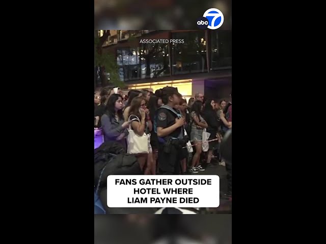 ⁣Fans gather outside hotel where Liam Payne died