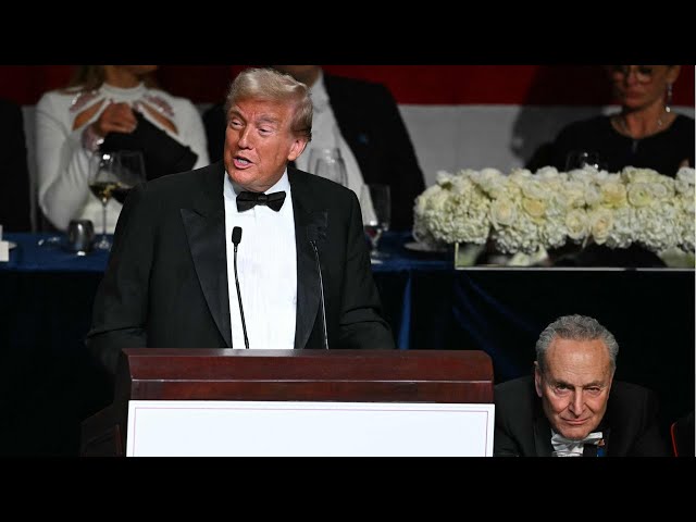 ⁣Donald Trump roasts 'very glum' Chuck Schumer at charity dinner