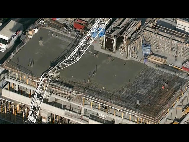 ⁣Crane collapses onto building under construction in Toronto