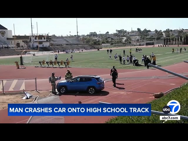 ⁣Car goes airborne, lands next to high school field mid-game in Torrance