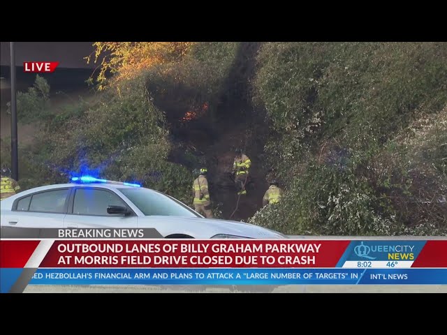 ⁣NCSHP car catches fire, closes part of Billy Graham Pkwy