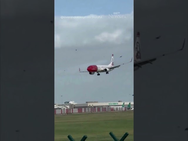 ⁣Plane struggles to land at Dublin Airport during Storm Ashley