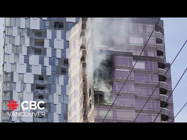 ⁣Apartment highrise fire in Vancouver's Coal Harbour sends debris flying