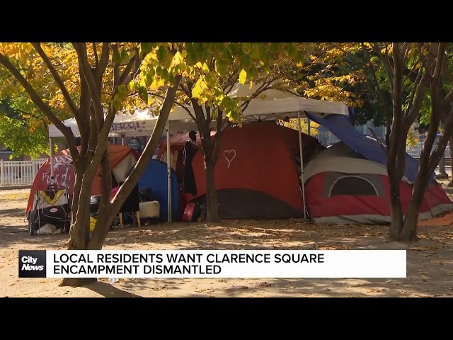 ⁣Locals call on City to remove downtown encampment