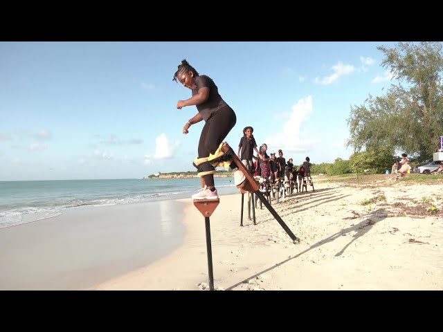 ⁣GROUP KEEPS STILT WALKING TRADITION ALIVE