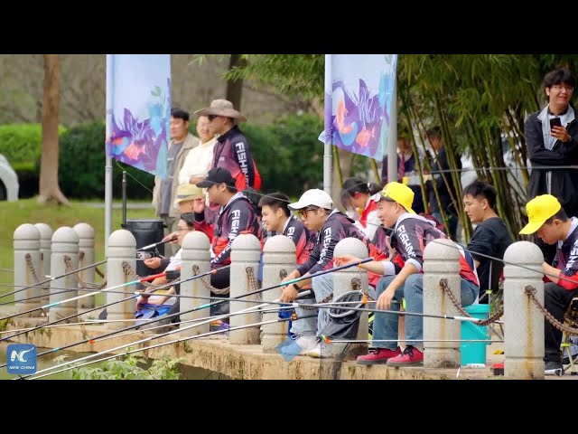 ⁣Hooked on campus fun: A special fishing contest in E China university