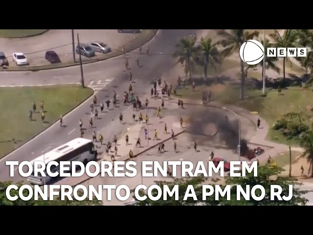 ⁣Torcedores do Peñarol entram em confronto com a PM no Rio de Janeiro