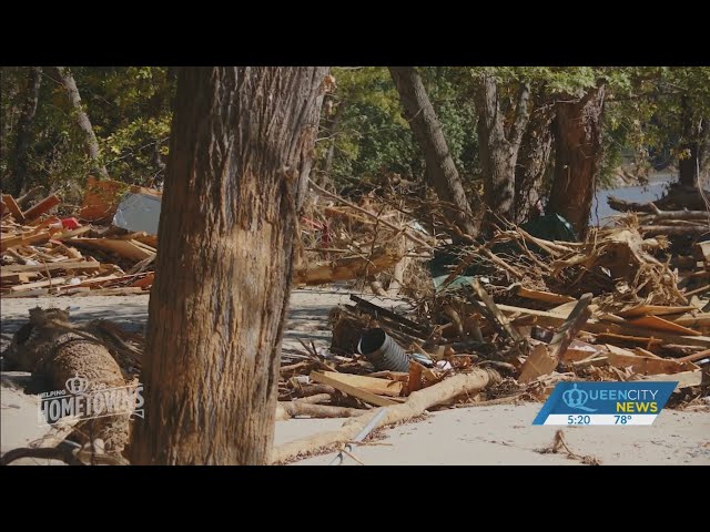 ⁣Signs among storm debris offer hope that normalcy will return one day