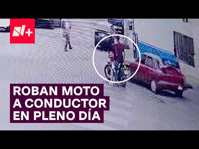 ⁣A punta de pistola pandilla roban motocicleta a conductor a plena luz del día - N+