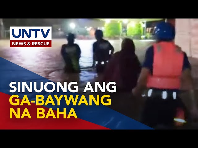 ⁣Pamilyang naipit sa ga-beywang na baha sa Bacoor, Cavite, nasaklolohan