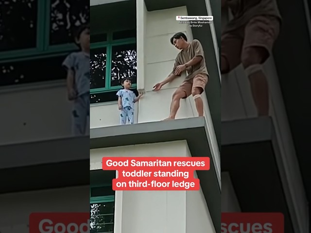 ⁣Good Samaritan rescues toddler standing on third-floor ledge #shorts