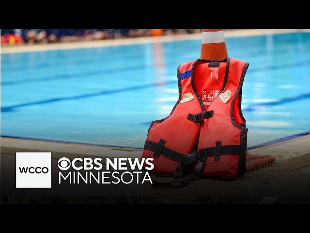 ⁣Swim instructor teaches water safety to families with autistic children