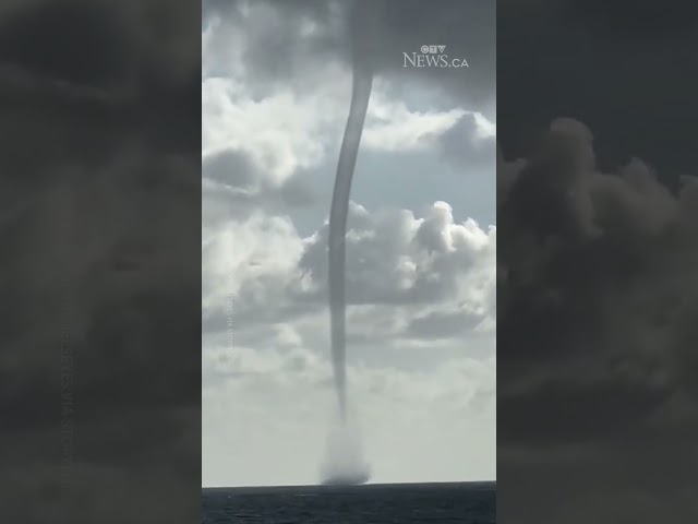 ⁣Towering waterspout swirls off Florida's coast | WATCH