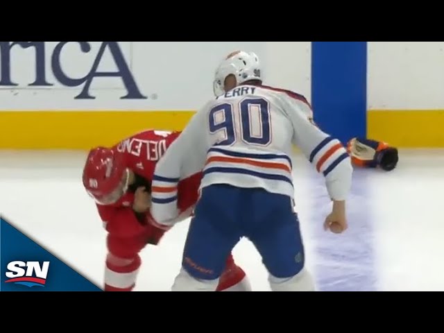 ⁣Oilers' Corey Perry Takes On Red Wings' Joe Veleno In Spirited Tilt