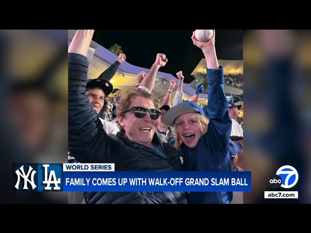 ⁣Father-son duo catches Freddie Freeman's historic grand slam ball