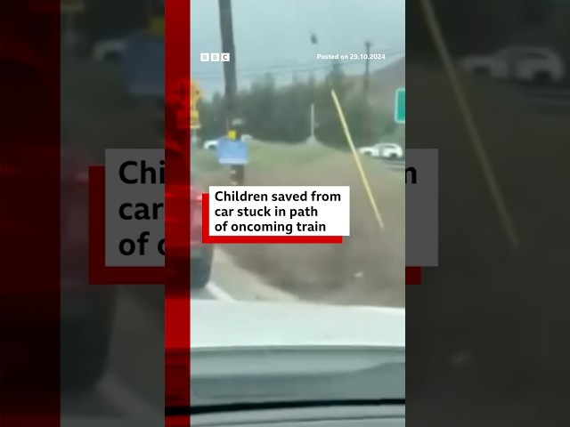 ⁣Two children saved from car stuck in path of oncoming train. #Train #US #BBCNews